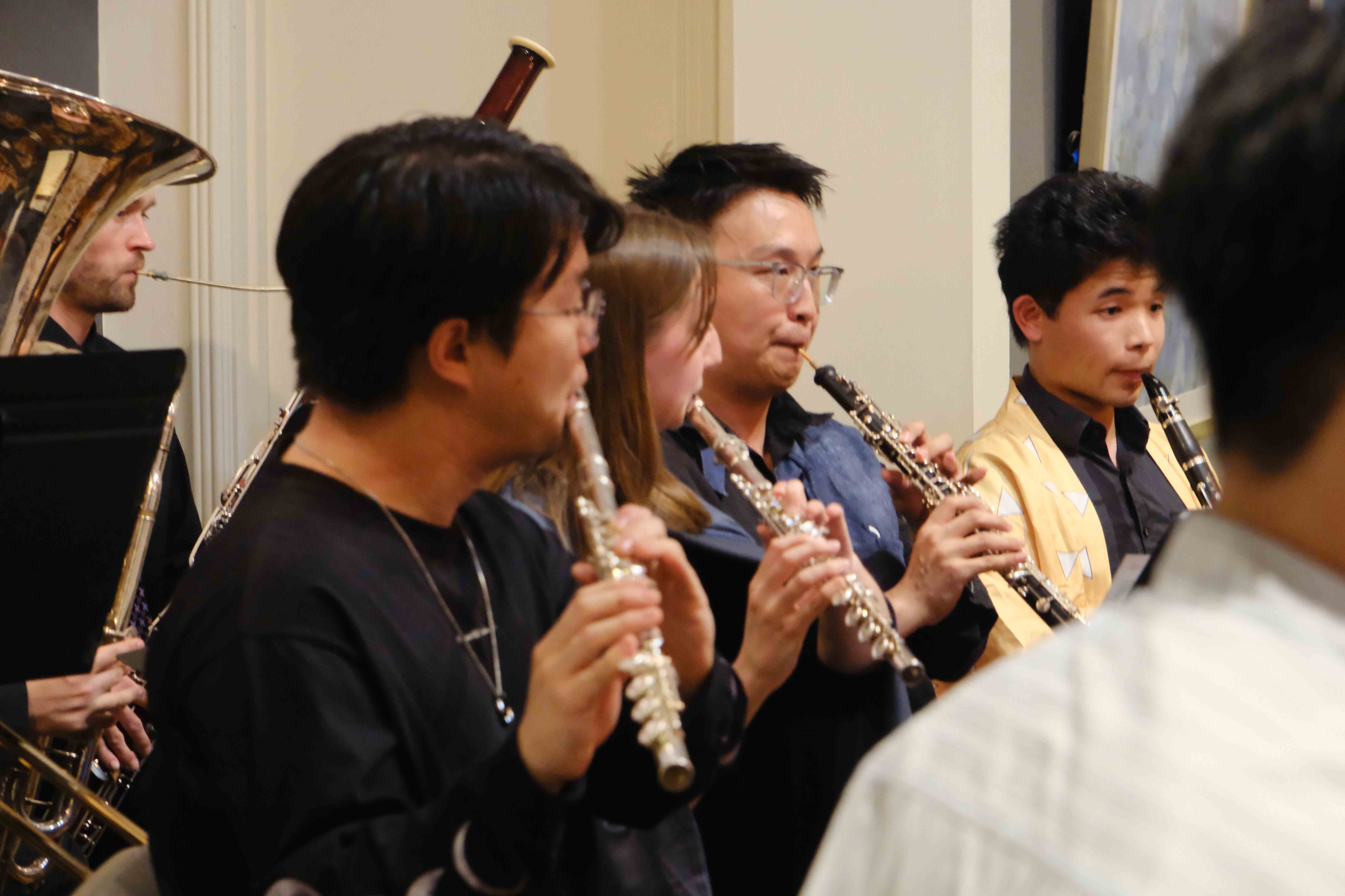Woodwind section with flutes, oboe, and clarinet