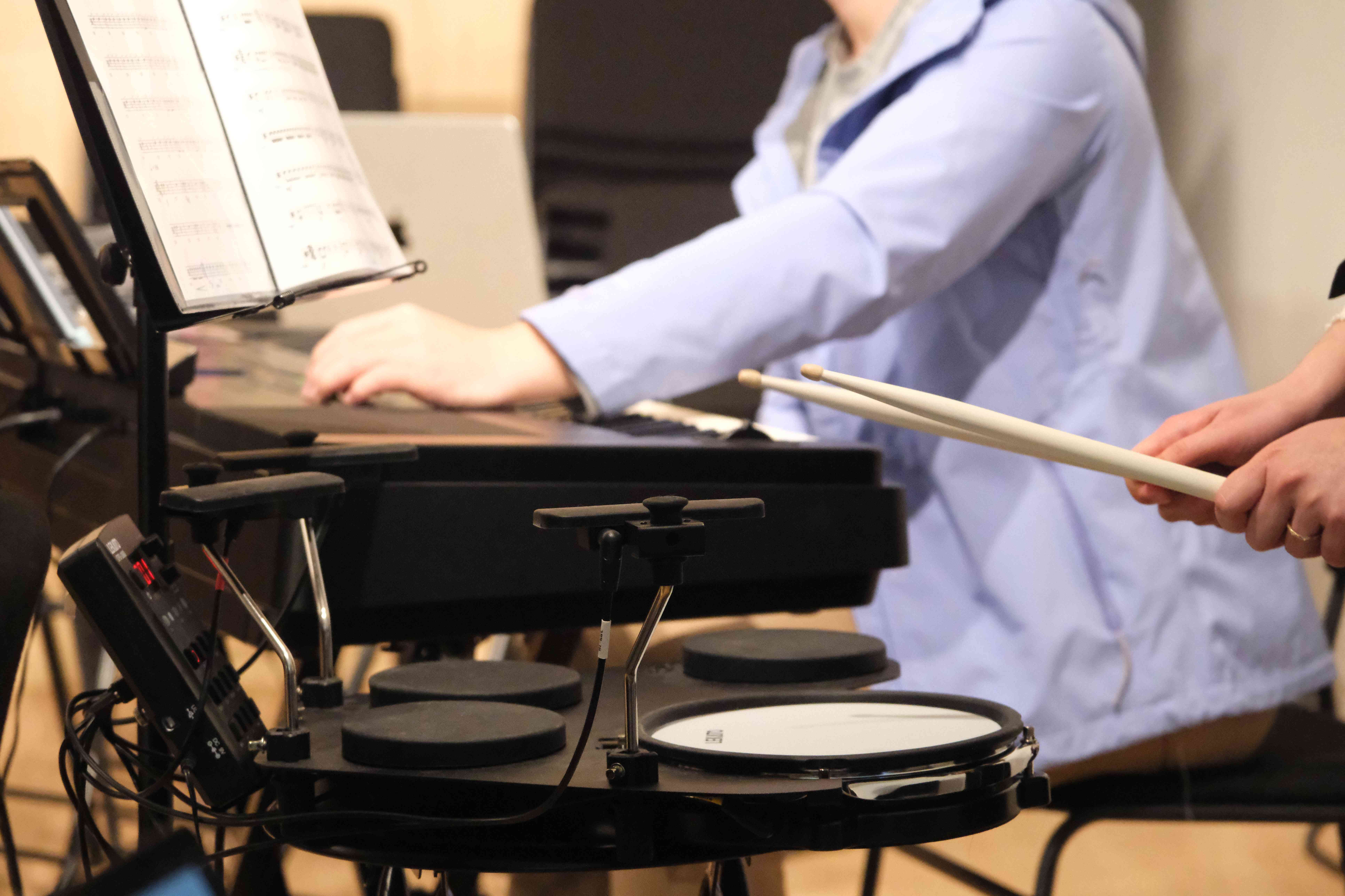 Percussionist with electronic drum kit during rehearsal